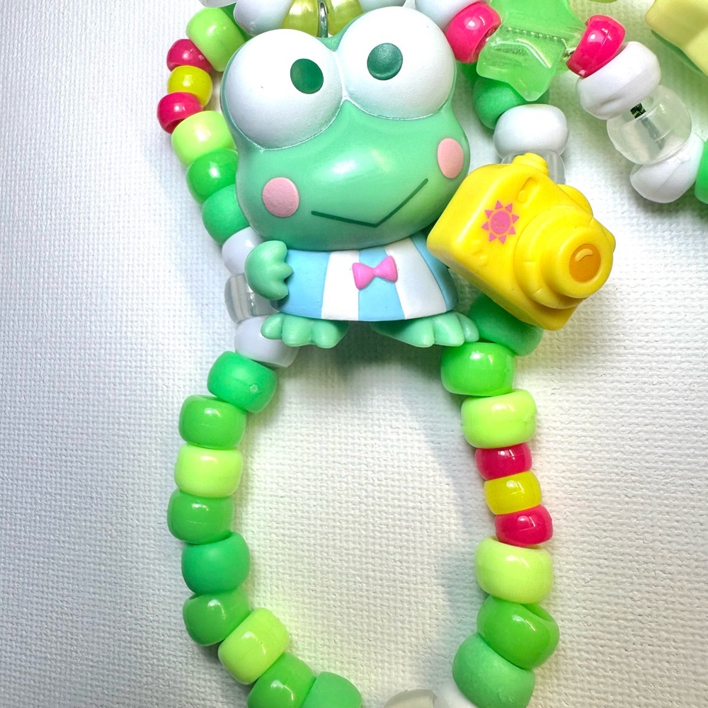 Charming Hello Kitty pendant Features a cute design on a kandi chain. Sanrio